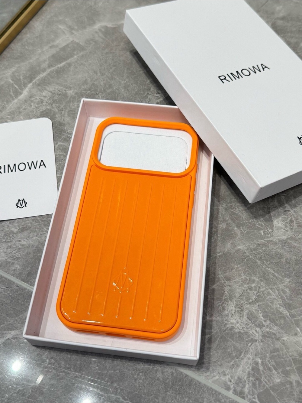 RIMOWA Vibrant Orange Ribbed iPhone Case IPhone 17 pro max